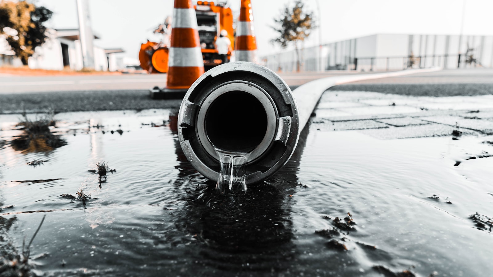 Water pouring from a broken pipe