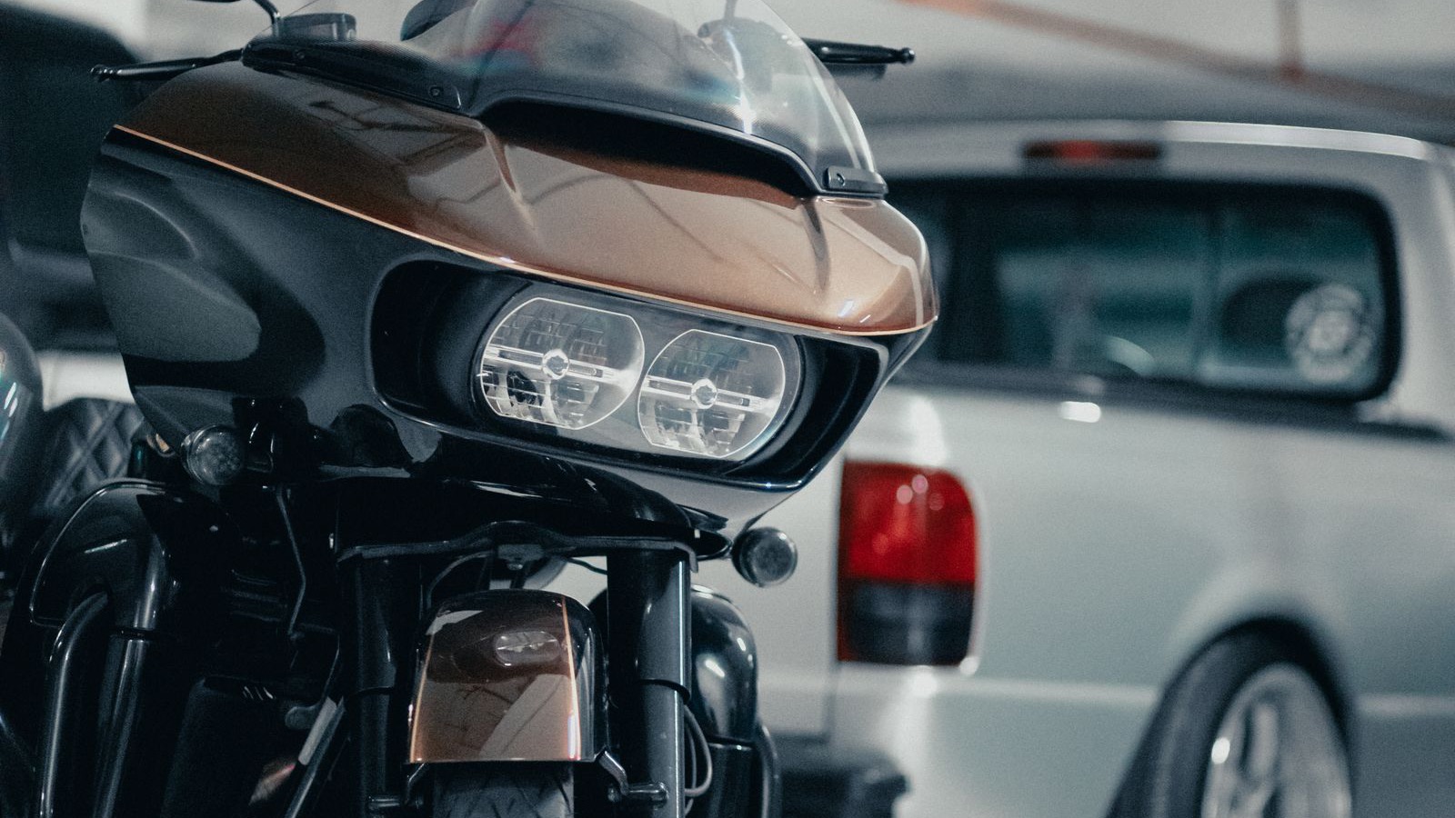 A touring motorcycle parked in a garage